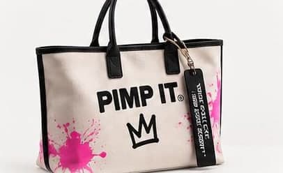 Canvas tote with PIMP IT lettering and pink paint splashes